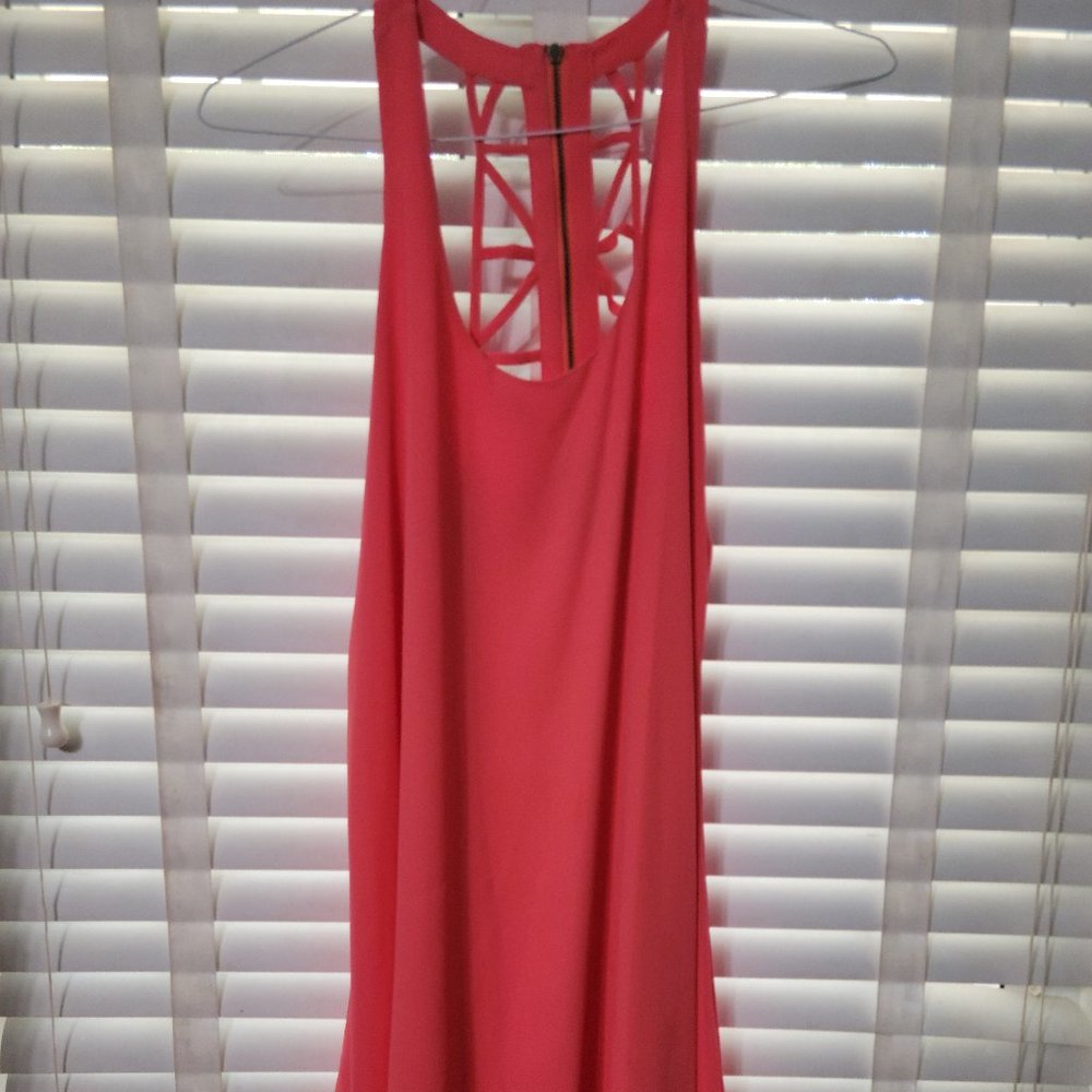 Fun BCBG Coral handkerchief bottom dress with lattice back
